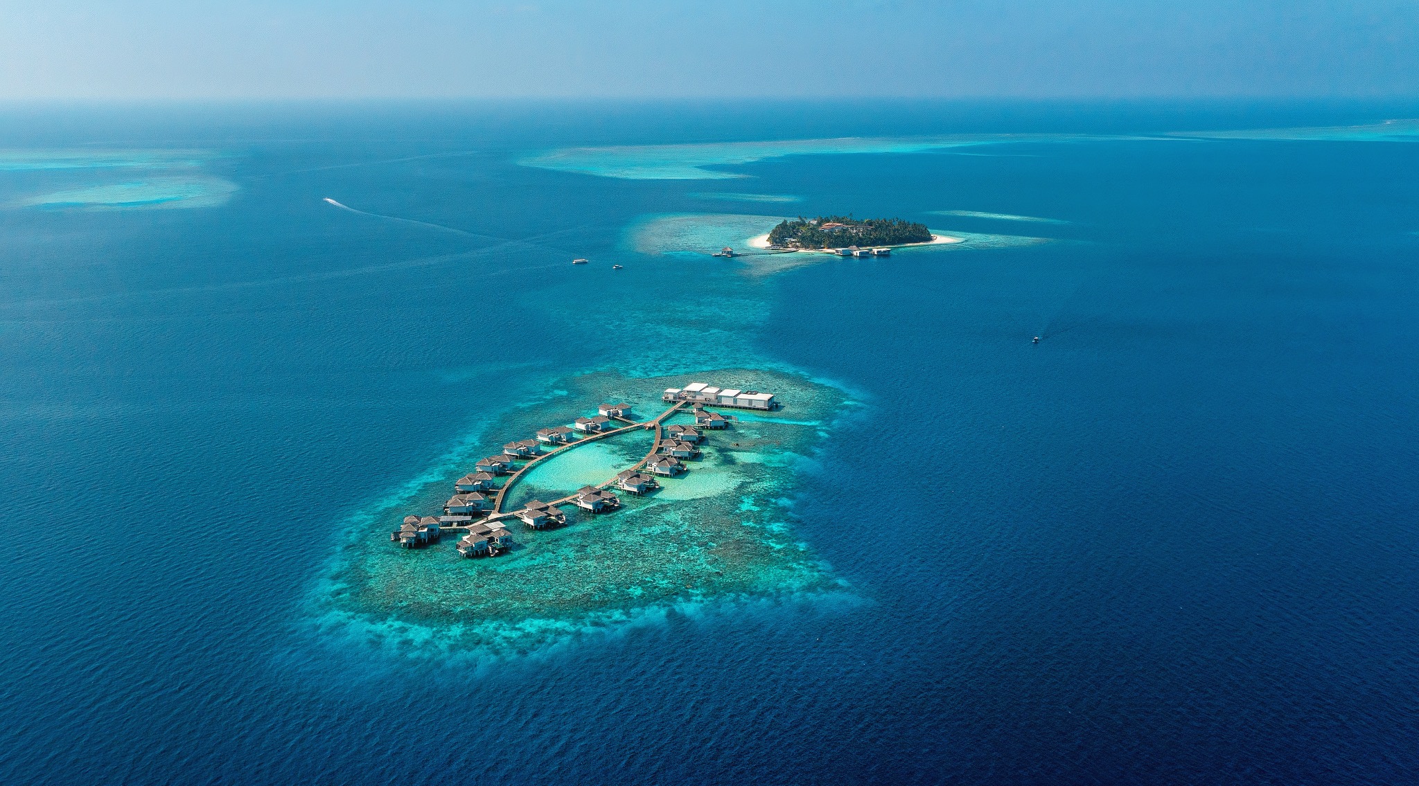 Luftaufnahme der beiden Inseln von The Halcyon Private Isles Maldives